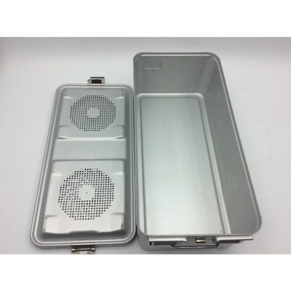 Silver metal aesculap sterile container tray with perforated circular sections and hinged lid with 2 plates