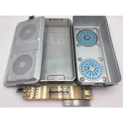 Silver metallic aesculap sterilization container 78532 with blue compartments mesh insert and olympus wa05990a base