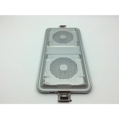 Silver metallic rectangular aesculap sterilization tray jf224r with two circular grilles and hinge mechanism at bottom