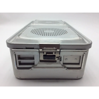 Aesculap sterilization tray jf224r is a silver metallic perforated surgical instrument box with latch 4 x 9.75 x 21.25 inches