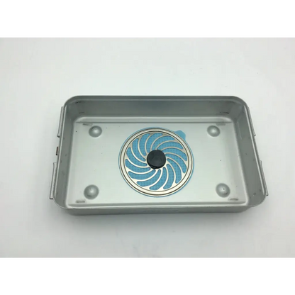 Silver rectangular metal drain tray with blue spiral grate and black button on aesculap three quarter container jn740 lid jk789