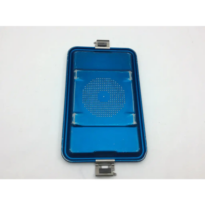 Blue rectangular phone screen protector with circular perforated pattern and metallic clasp for aesculap container jn740 lid jk789