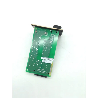 Green printed circuit board with black connectors and silver screws on the back of alaris 8000 8015 pc rear panel for biomedical service and responsible electronics recycling replacement parts