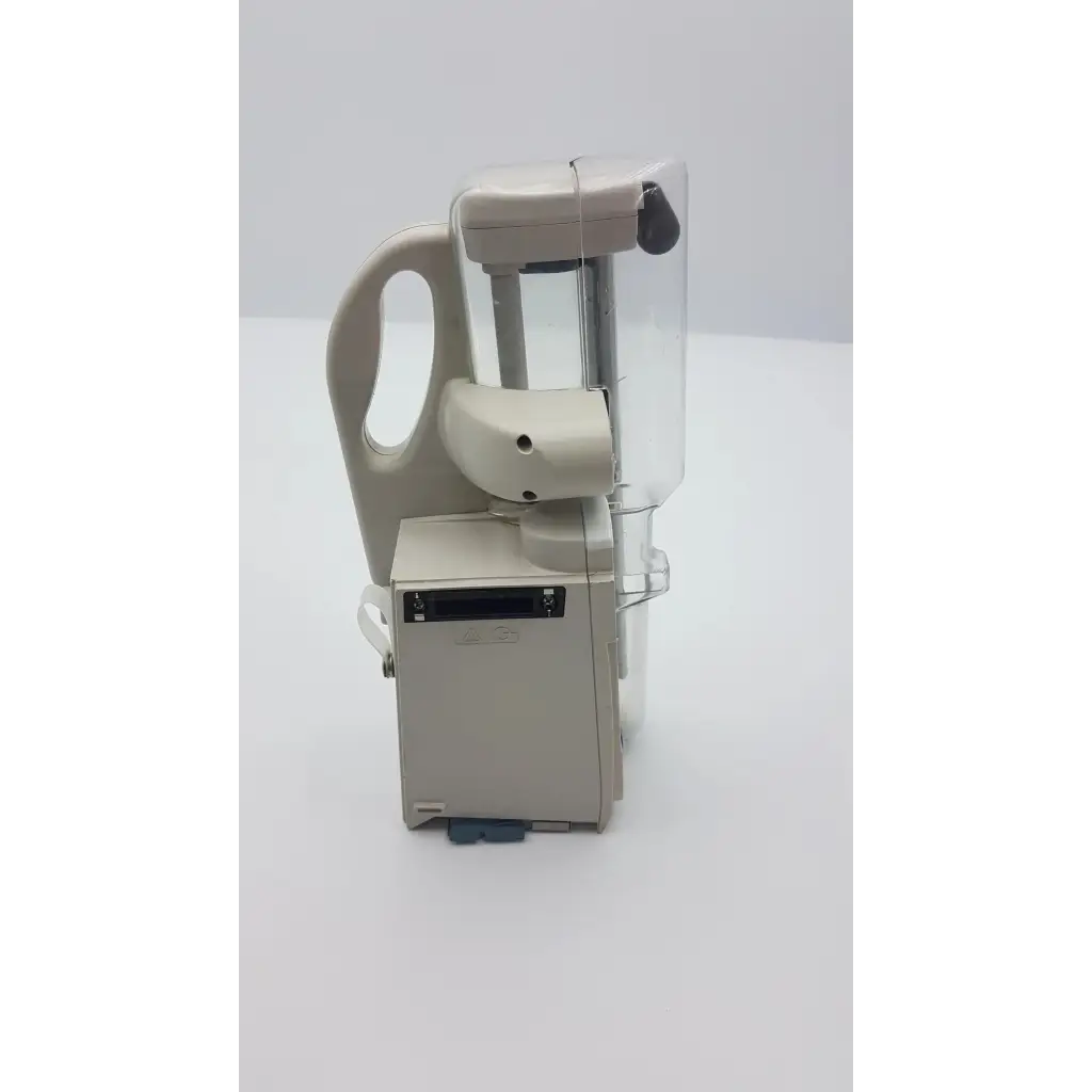 Beige plastic and metal dental handpiece with transparent chamber for alaris medley 8120 pca module adi-7 use