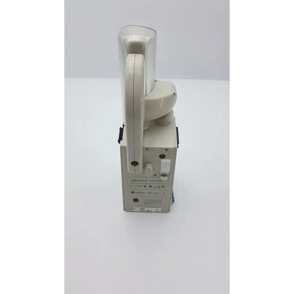 Beige handheld alaris medley pca module with transparent protective cover and ergonomic handle for medical use