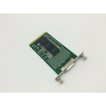 Green circuit board with black integrated circuits and metallic d-sub connector of alcon exm-26 multi-port rs 422