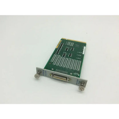 Green circuit board with silver bracket and connectors labeled emc28 alcon for exm-26 multi-port rs 422 device