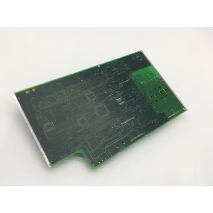 Green rectangular rev ag pcb with intricate copper traces and solder pads for pcb lpas illum controller assembly