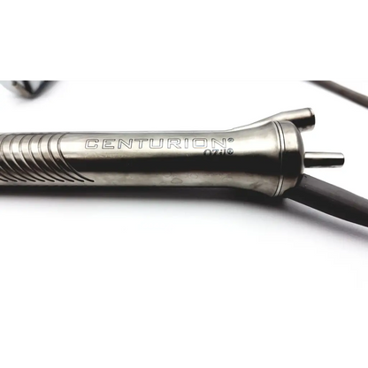 Silver metallic alcon centrurion ozil centrurion ozil handpiece with textured grip and precise engravings for surgery