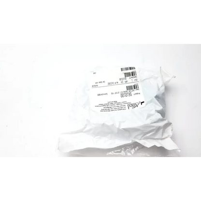A crumpled white plastic bag with a printed label and barcode for allied healthcare suction tubing kit packaging