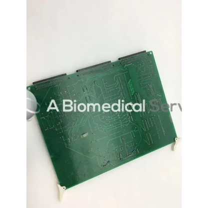 Green rectangular aloka ep-3314d nep-14t board with intricate copper traces and multiple edge connectors