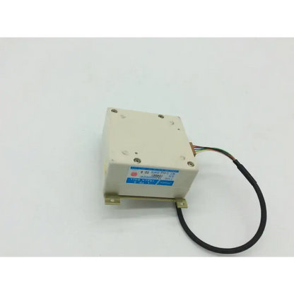 Off-white rectangular aloka ultrasound tamagawa electronic module with black cable and labeled stickers track ball ta3420n1241