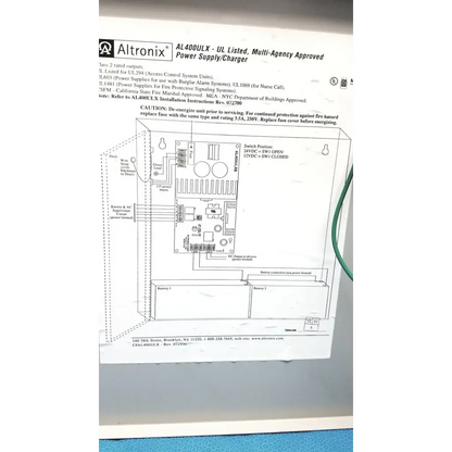 Altronix al400ulx power supply charger with schematic diagram and labeled components in black metal housing