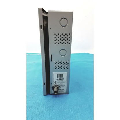 Silver metallic altronix al400ulx power supply with perforated ventilation panels and circular connector port visible