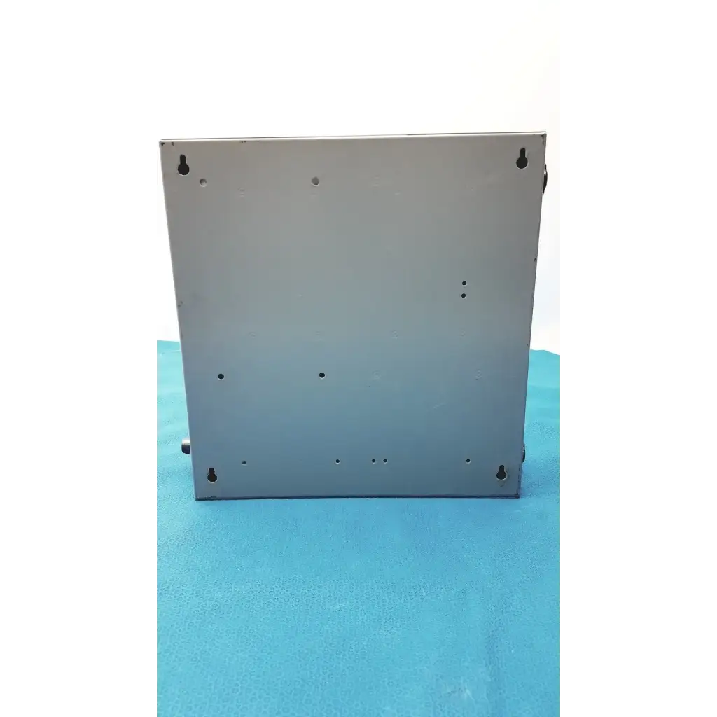 Gray metal mounting bracket with multiple screw holes for altronix al400ulx power supply charger back side view