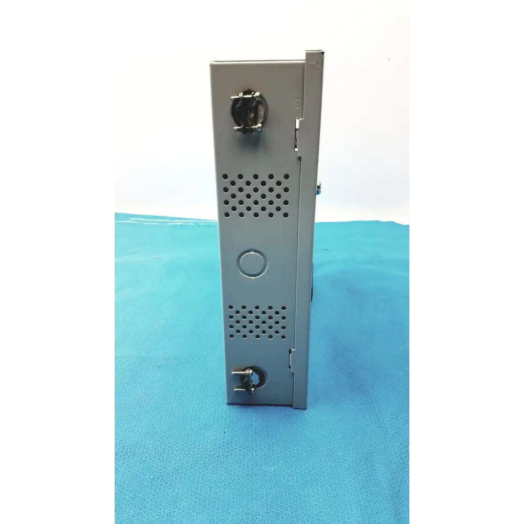 Gray metal server rack with perforated side panels and circular ports on the back of altronix al400ulx power supply