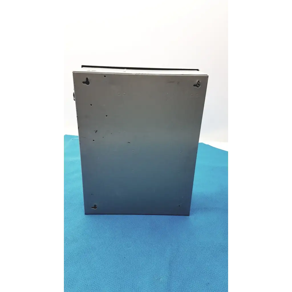 Gray metallic rectangular altronix smp5ctx high current power supply charger with four corner mounting holes