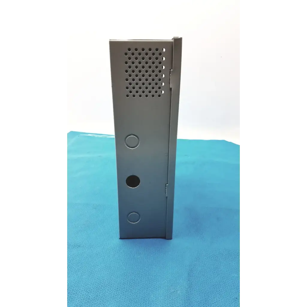 Gray metal enclosure of altronix smp5ctx high current power supply with perforated panel and circular mounting holes