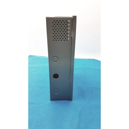 Gray metal enclosure of altronix smp5ctx high current power supply with perforated panel and circular mounting holes