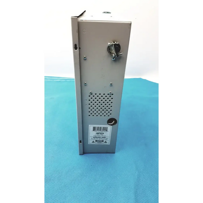 Gray metal altronix smp5ctx high current power supply with perforated panel and key-operated lock on the side
