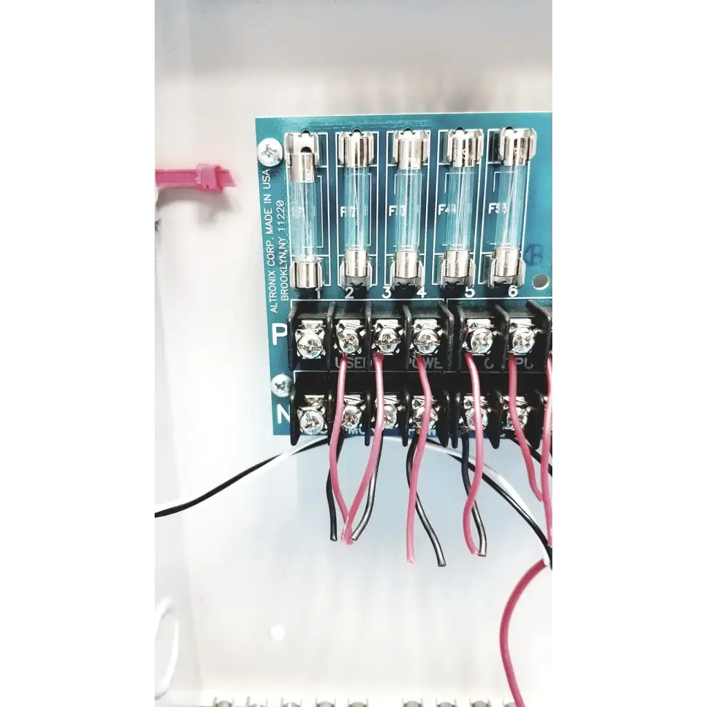 Blue altronix smp5ctx high current power supply charger 12vdc 24vdc showing front panel details