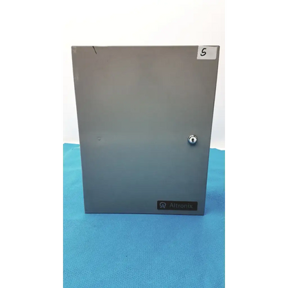 Gray metal altronix smp5ctx power supply enclosure with keyhole and label for 12vdc or 24vdc power management