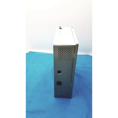 Gray metal server rack with perforated ventilation panel and mounting holes on the back of altronix smp5ctx power supply