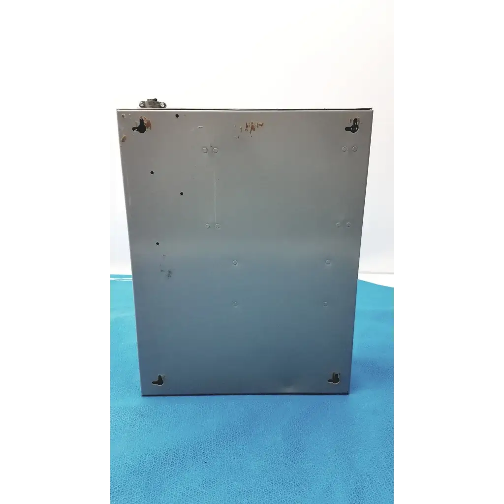 Silver metallic rectangular altronix smp5ctx power supply with mounting holes and slightly worn finish for 12vdc or 24vdc use
