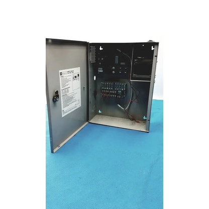 Gray metal altronix smp5ctx power supply with hinged door showing internal wiring and terminal blocks for 12vdc or 24vdc