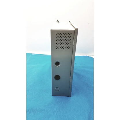 Gray metal industrial enclosure with perforated panel and circular cutouts for altronix smp5ctx power supply charger