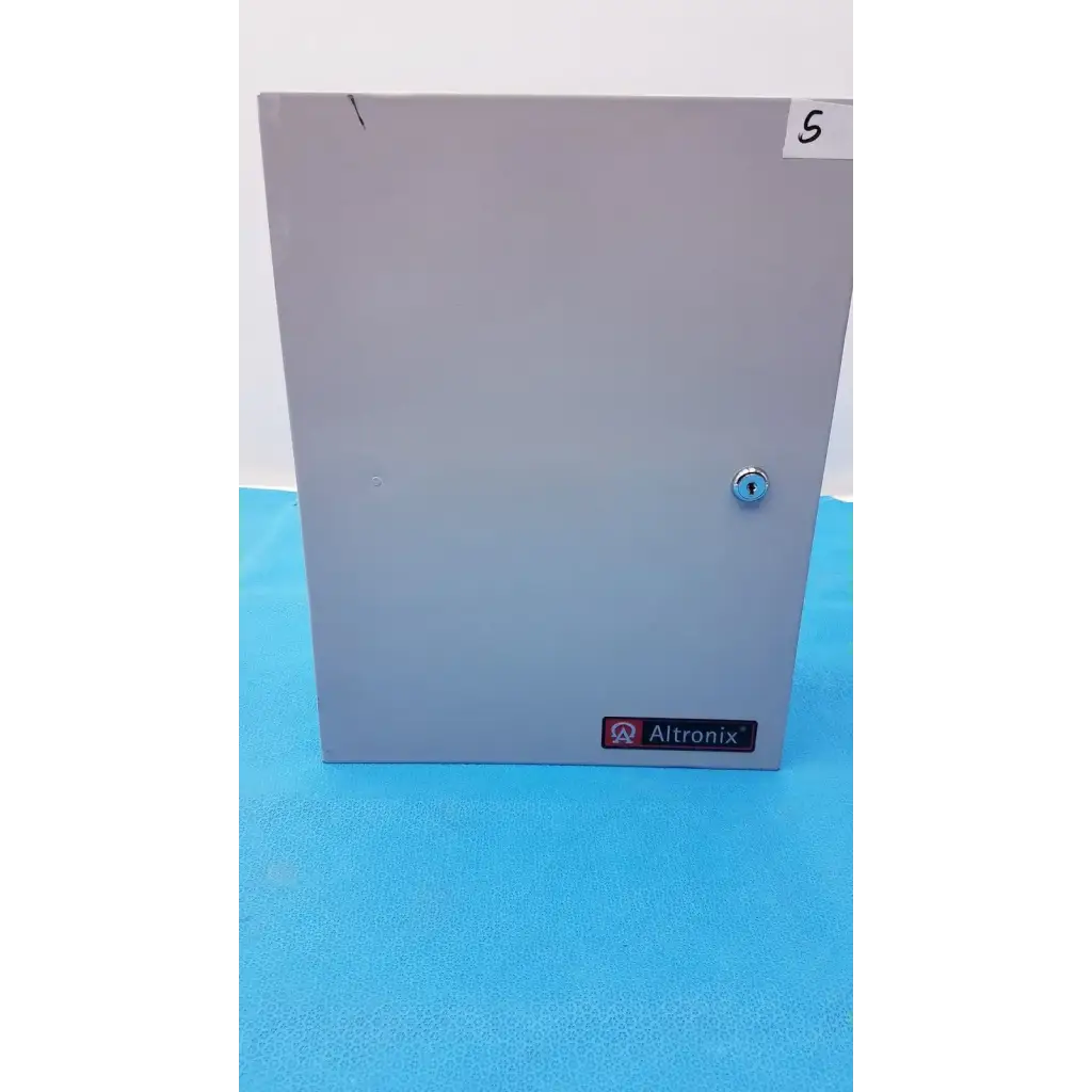Gray metal altronix smp5ctx power supply enclosure with keyed lock and label for 12vdc or 24vdc power systems