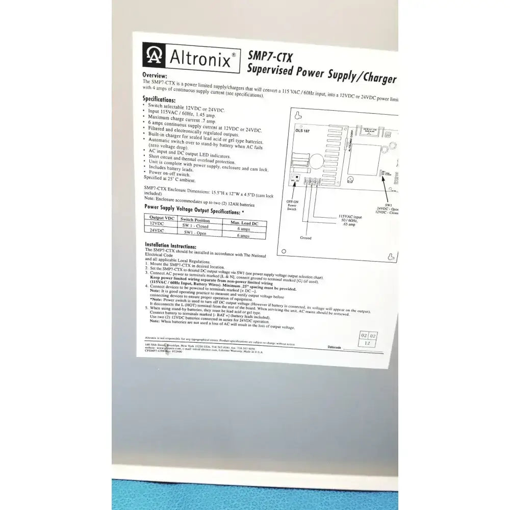 Altronix smp7-ctx high current power supply charger in black and gray with labeled 12vdc 24vdc input output ports