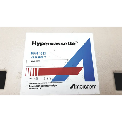 White label for amersham biosciences xray film hypercassette rpn 1643 with bold blue red geometric logo and black text