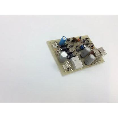 Beige amrex swept galvo rev c board with blue and gray capacitors black resistors white connectors and clear relay