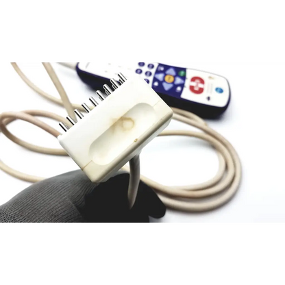 Off-white plastic connector with multiple metallic pins for anacom medtek a1804-088dj medical device use