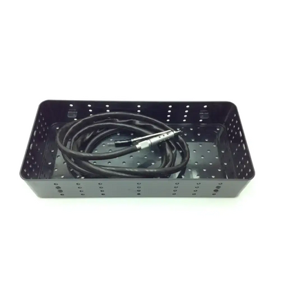 Black perforated plastic tray holding an anspach micro max plus neurosurgery coiled black cable with silver tool head