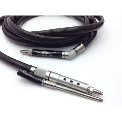 Black coiled cable with two metallic medical-grade airbrush tips labeled nanspach and ce for anspach micro max plus