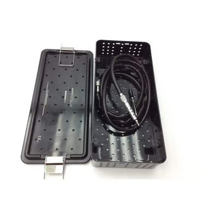 Black perforated plastic sterilization tray with silver clasp containing a coiled black and silver dental handpiece for anspach micro max plus neurosurgery