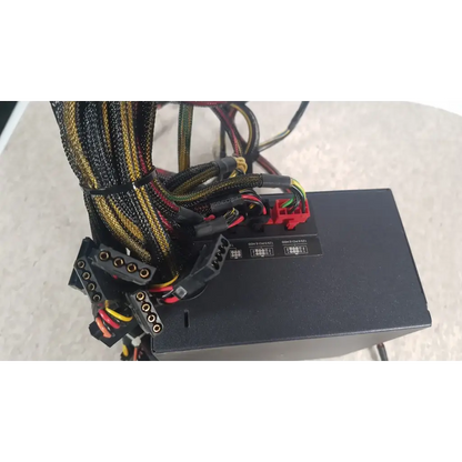 Antec TruePower 550W black switching power supply unit with colorful braided cables and red connectors