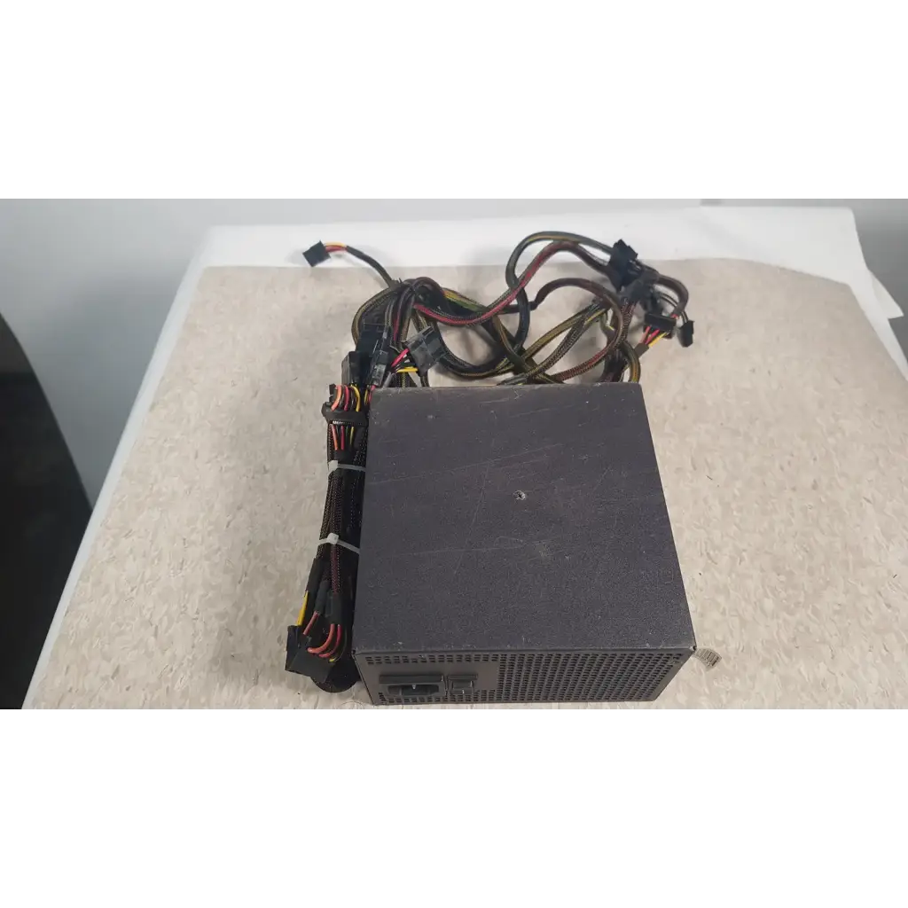 Black rectangular antec truepower 550w switching power supply with bundled cables and connectors for desktop use