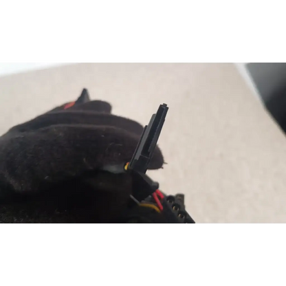 Black plastic sata power connector with red and yellow wires attached to antec truepower 550w black switching power supply