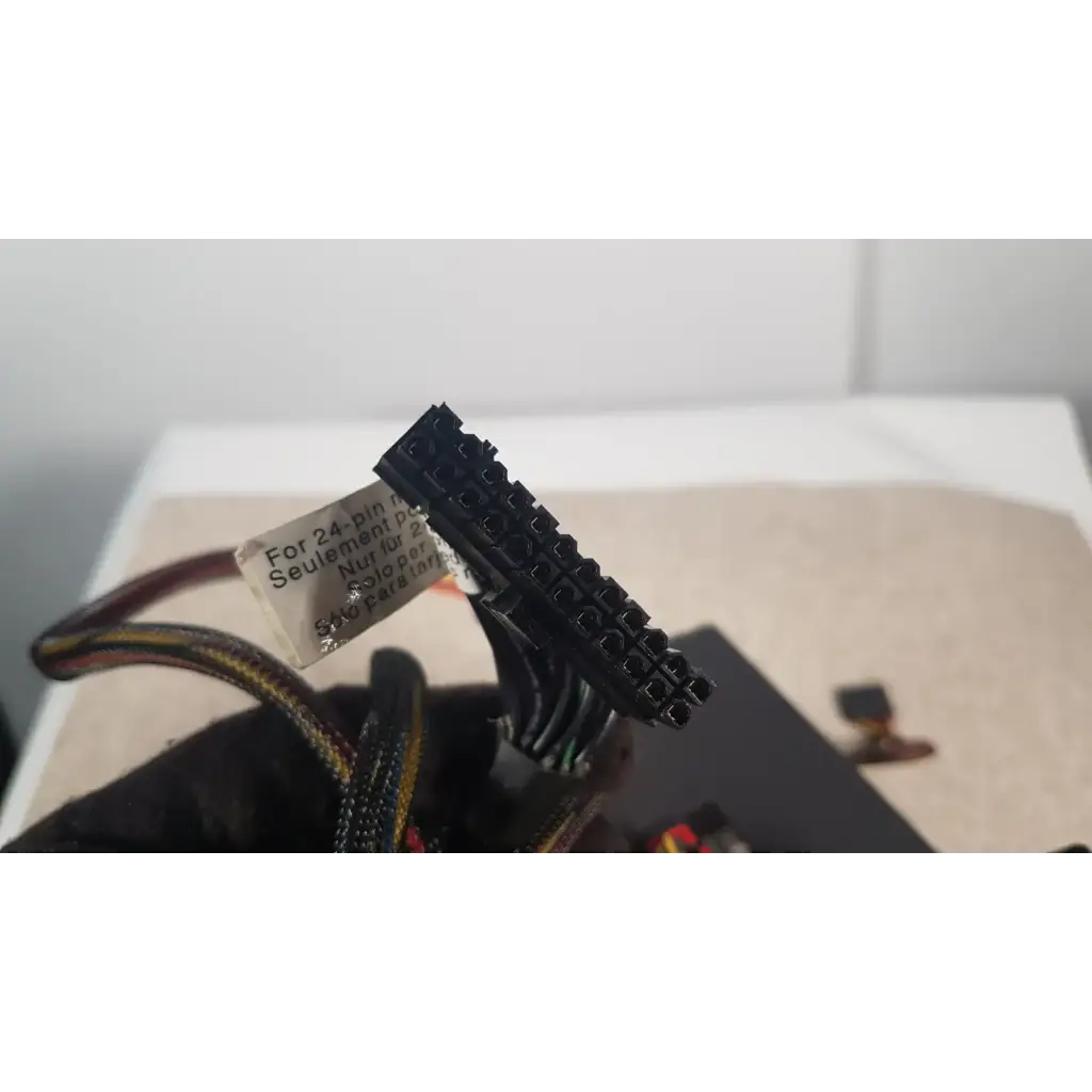 Black 24-pin power connector with label for 24-pin motherboards on antec truepower 550w black switching power supply