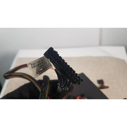 Black 24-pin power connector with label for 24-pin motherboards on antec truepower 550w black switching power supply