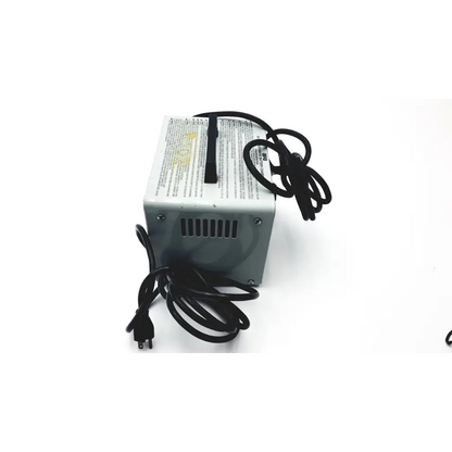 Gray volt automatic battery charger with black coiled cords and handle for easy portable use