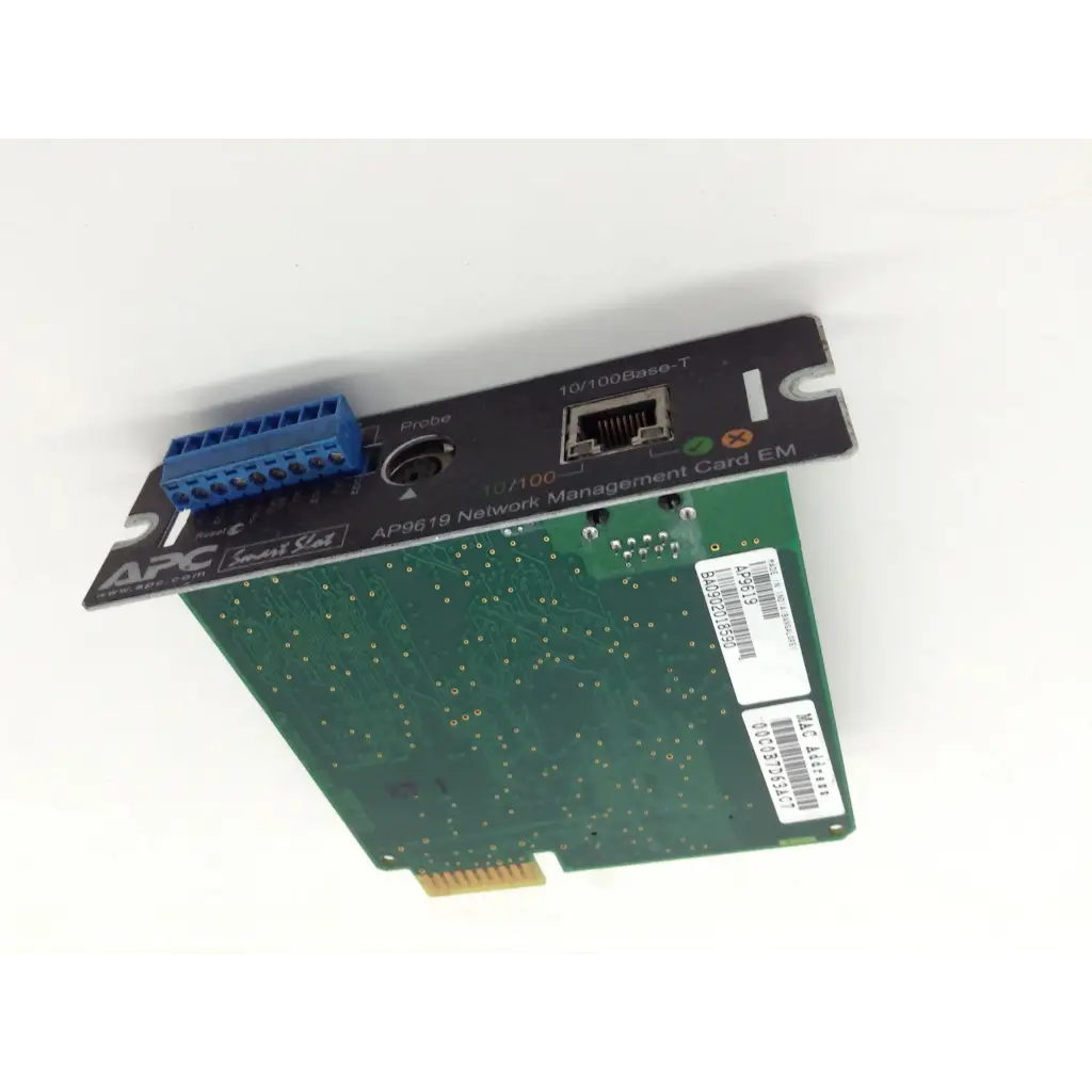 Black and green apc ap9610 network adapter ap9619 with blue connector on the left side for network management use
