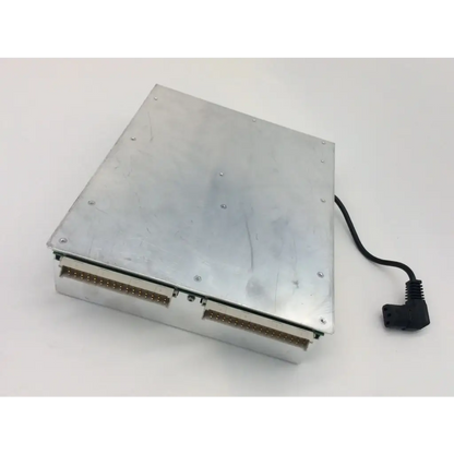 Silver metallic rectangular apple mac pro a1289 power supply with gold connectors and black power cable back side view