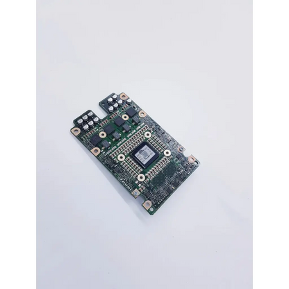 Green circuit board with black components and silver solder points in apple power mac g5 desktop with spacelabs mpc860 cpu