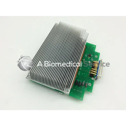 Silver aluminum heat sink mounted on green circuit board with components in applied biosystems n805-9034 heater