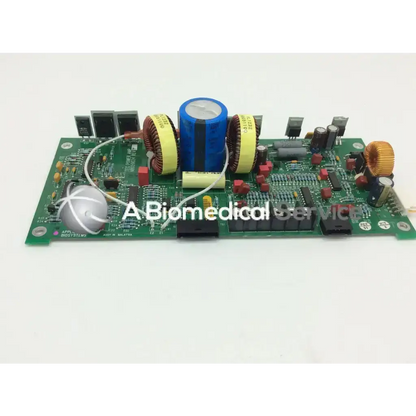 Green printed circuit board of applied biosystems tec power n8059024 rev featuring blue capacitor and yellow inductors