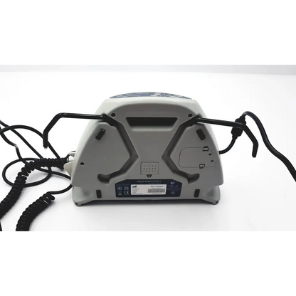 Back side of arjo-huntleigh 630003 gray plastic auto logic pressure pump with black coiled cords and branded label